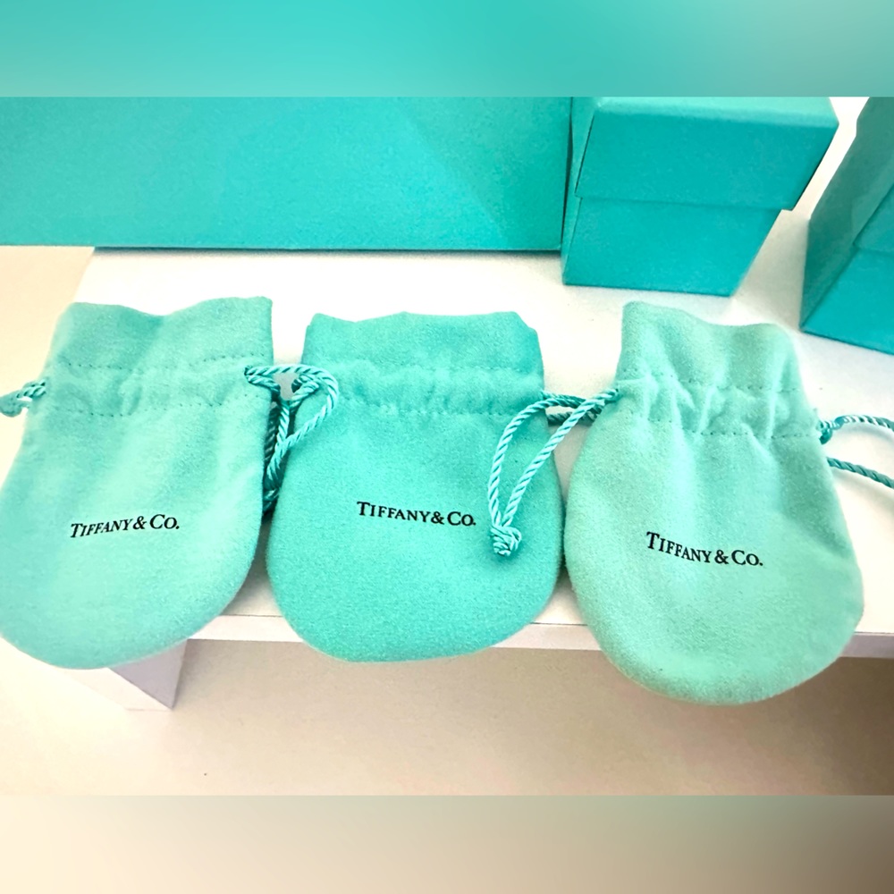 Tiffany & Co., Packaging Small Blue Drawstring Jewelry Pouches.